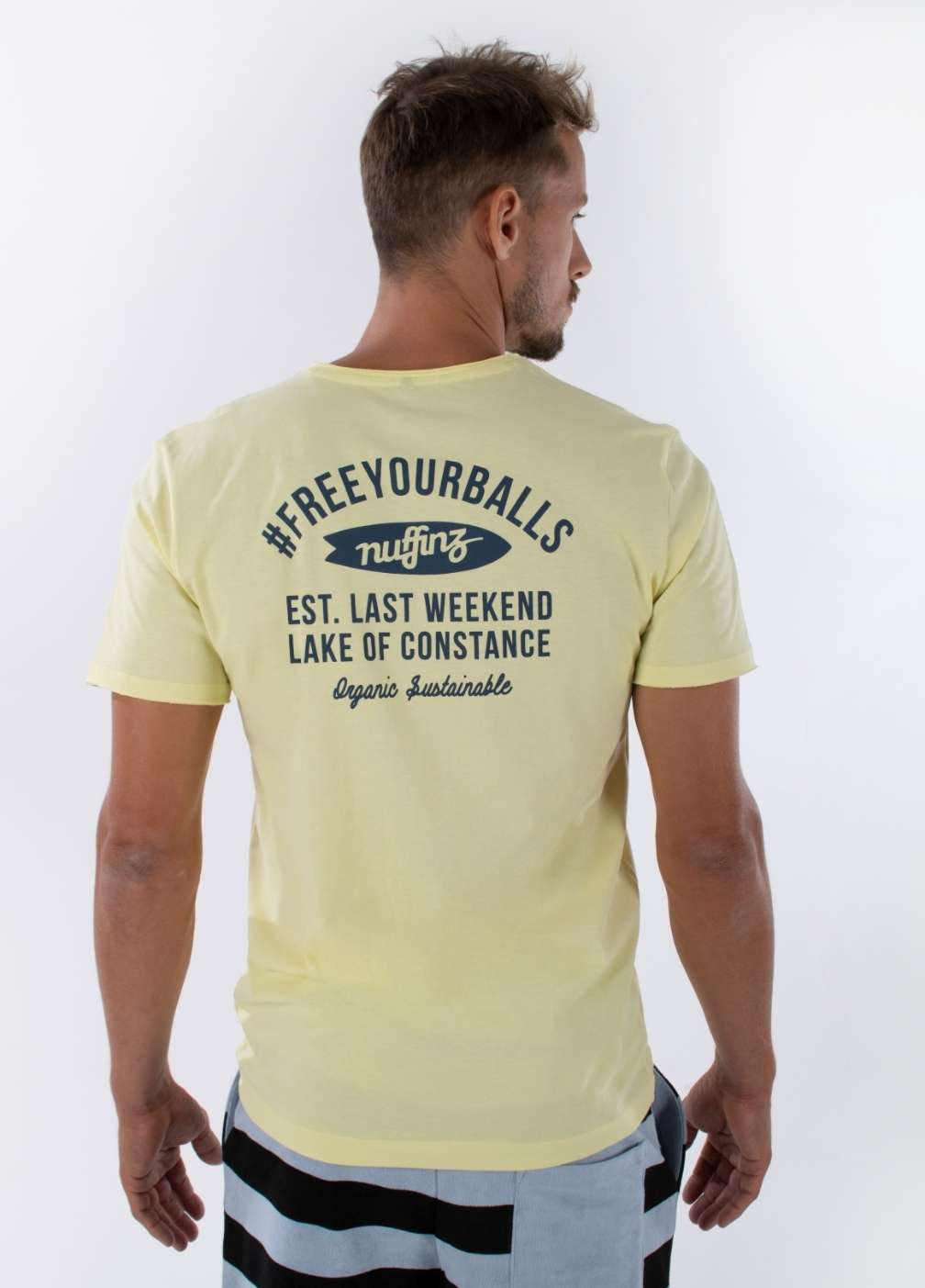 nuffinz LEMON GRASS T-SHIRT PRINT - whole outfit visible from the back - sustainable men's t shirts - yellow
